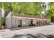 Charming building with large display windows, brick, and a red tile roof at 746 United Se Ave, Atlanta, GA 30312