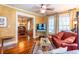 Inviting living room with hardwood floors, opening to dining room, and featuring a comfortable seating area with sofa at 746 United Se Ave, Atlanta, GA 30312