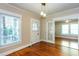 Inviting living room featuring shiny hardwood floors and lots of natural light at 746 United Se Ave, Atlanta, GA 30312