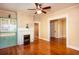 Elegant living room featuring a fireplace, custom built-ins, and hardwood floors at 746 United Se Ave, Atlanta, GA 30312