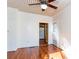 Bright sunroom with shiplap walls, hardwood floors, access to the kitchen, and an exterior door at 746 United Se Ave, Atlanta, GA 30312