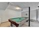 Finished basement with a pool table at 1922 Marshes Glenn Dr, Norcross, GA 30071