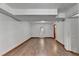 Bright and spacious basement with wood-look flooring and a walk-out door at 1922 Marshes Glenn Dr, Norcross, GA 30071