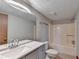 Bathroom featuring a shower-tub combo, large mirror, and white vanity at 1922 Marshes Glenn Dr, Norcross, GA 30071