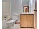 Tiled bathroom with sink, toilet, and tub with shower at 1922 Marshes Glenn Dr, Norcross, GA 30071
