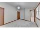 Bright bedroom with gray walls, plush carpeting, and a bathroom en suite at 1922 Marshes Glenn Dr, Norcross, GA 30071