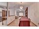 View of dining room featuring wood floors, a chandelier, and an open floor plan at 1922 Marshes Glenn Dr, Norcross, GA 30071