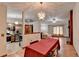 View of open floor plan featuring dining room, kitchen, and living room with fireplace at 1922 Marshes Glenn Dr, Norcross, GA 30071