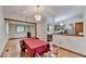 Bright dining room with hardwood flooring adjacent to kitchen at 1922 Marshes Glenn Dr, Norcross, GA 30071