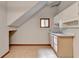 Kitchenette featuring white cabinets and an open layout at 1922 Marshes Glenn Dr, Norcross, GA 30071