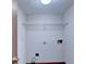 Small laundry room featuring one wire shelf at 1922 Marshes Glenn Dr, Norcross, GA 30071