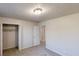 Bedroom with window, neutral carpet, and a closet at 3359 Mansfield Ln, Snellville, GA 30039