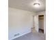 Bedroom with neutral carpeting, ceiling light, and closet at 3359 Mansfield Ln, Snellville, GA 30039