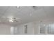 Spacious basement area featuring drop ceiling, carpet, and multiple windows at 6334 Milo Dr, Austell, GA 30168