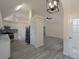 Open living area featuring stainless steel refrigerator and clear sightlines to multiple rooms at 6334 Milo Dr, Austell, GA 30168