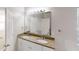 Bathroom featuring double sinks with granite countertop at 6643 Hill Creek Cv, Lithonia, GA 30058