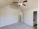 Spacious bedroom featuring vaulted ceiling, fan and two closets for storage at 6643 Hill Creek Cv, Lithonia, GA 30058