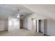 Spacious bedroom featuring a vaulted ceiling with fan and a closet for storage at 6643 Hill Creek Cv, Lithonia, GA 30058