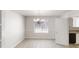 Elegant dining room with hardwood floors, chandelier, and natural light at 6643 Hill Creek Cv, Lithonia, GA 30058