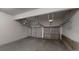 Spacious garage with dual doors for convenient vehicle storage and access at 6643 Hill Creek Cv, Lithonia, GA 30058