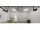 Well-lit garage featuring convenient access to the main house at 6643 Hill Creek Cv, Lithonia, GA 30058