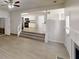Bright open-concept living area leading to the kitchen, creating a seamless flow at 6643 Hill Creek Cv, Lithonia, GA 30058
