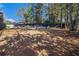 Large backyard with trees and landscaping at 284 Regal Dr, Lawrenceville, GA 30046