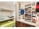 Spacious walk-in closet with custom shelving and ample storage space for clothing and accessories at 284 Regal Dr, Lawrenceville, GA 30046