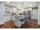 Bright and modern kitchen with a central island, breakfast bar and stainless steel appliances at 284 Regal Dr, Lawrenceville, GA 30046