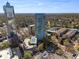 Aerial view of the building with a private tennis court and a parking garage at 2870 Pharr Court South Nw # 1202, Atlanta, GA 30305
