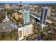 Beautiful aerial view showcasing multiple high-rise buildings in an urban setting with greenery at 2870 Pharr Court South Nw # 1202, Atlanta, GA 30305