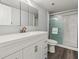 Contemporary bathroom featuring walk-in shower, modern fixtures, and vanity with ample storage at 2870 Pharr Court South Nw # 1202, Atlanta, GA 30305