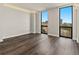 Well-lit bedroom featuring large windows that offer great city views at 2870 Pharr Court South Nw # 1202, Atlanta, GA 30305