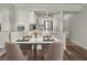 Bright dining area features a marble table, seating for four, and adjoins the kitchen at 2870 Pharr Court South Nw # 1202, Atlanta, GA 30305