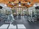 Community gym with multiple workout stations and a wood beam ceiling at 2870 Pharr Court South Nw # 1202, Atlanta, GA 30305