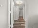 Hallway that offers a glimpse into the bathroom with a glass-enclosed shower at 2870 Pharr Court South Nw # 1202, Atlanta, GA 30305