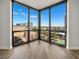 Corner windows offering expansive views of the city skyline from this inviting living space at 2870 Pharr Court South Nw # 1202, Atlanta, GA 30305
