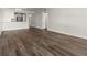 Neutral living room features updated hardwood floors and access to the kitchen at 2870 Pharr Court South Nw # 1202, Atlanta, GA 30305