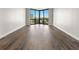 Open living space with updated hardwood floors and large windows at 2870 Pharr Court South Nw # 1202, Atlanta, GA 30305