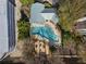 Aerial view of a beautiful outdoor pool, surrounded by trees and lounge seating area at 2870 Pharr Court South Nw # 1202, Atlanta, GA 30305