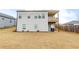 The rear of the property, featuring a lush yard and a partial view of the house at 525 Appalachian Pl, Canton, GA 30114
