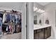 Bathroom featuring double vanity and walk-in closet at 525 Appalachian Pl, Canton, GA 30114