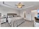 Bedroom features a tray ceiling, carpet floors and a spacious layout at 525 Appalachian Pl, Canton, GA 30114