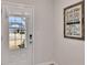 Bright entryway featuring a glass door with a view of the neighborhood and a decor at 525 Appalachian Pl, Canton, GA 30114