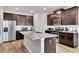 Well-appointed kitchen with stainless steel appliances and large center island at 525 Appalachian Pl, Canton, GA 30114