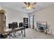 Home office featuring a large desk, shelving, and a comfortable chair at 525 Appalachian Pl, Canton, GA 30114