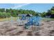 Community playground with swings, slides, and other play equipment at 525 Appalachian Pl, Canton, GA 30114