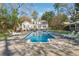 Inviting backyard pool with lounge chairs, perfect for relaxation and entertaining in a private setting at 890 W Wesley Nw Rd, Atlanta, GA 30327