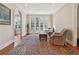 Bright and inviting sitting room with French doors and comfortable seating at 890 W Wesley Nw Rd, Atlanta, GA 30327