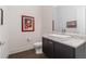 Powder room with modern rectangle sink, stylish fixtures, and contemporary artwork at 1200 Ponce De Leon Ne Ave # A-19, Atlanta, GA 30306
